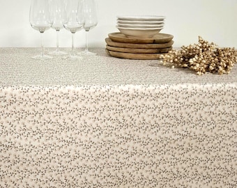 Easy-care powder pink floral coated tablecloth
