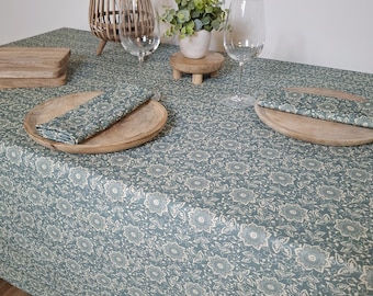 Cotton tablecloth with blue and green Indian motifs. Square, round, rectangular, or oval tablecloths available upon request.