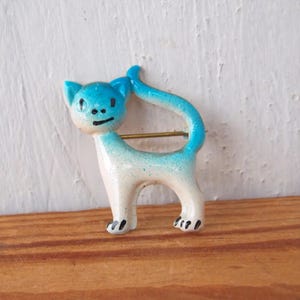 Vintage speld kat, stripfiguur, rugzak kinderbroche, retro jaren 80, sprookjesfiguur.
