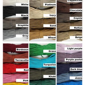 May include: A collection of colorful rope samples, each tied into a neat bow. Colors include white, black, gray, red, and blue, with labels such as "White," "Black," "Gray," "Red," and "Blue." The image showcases a variety of shades and textures.