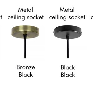 May include: A selection of ceiling sockets in various finishes. Includes a wooden socket with a jute cord, a bronze metal socket with a black cord, a black metal socket with a black cord, and a white metal socket with a white cord.