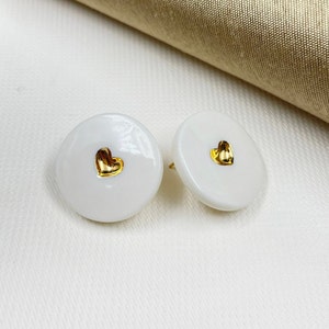 White porcelain heart earrings handpainted with pure gold.