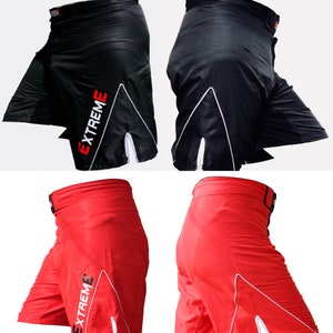 K&ouml;nnte beinhalten: Zwei Paar Sport-Shorts mit einem wei&szlig;en Streifen und dem Wort "EXTREME" in Rot. Ein Paar ist schwarz und das andere rot.