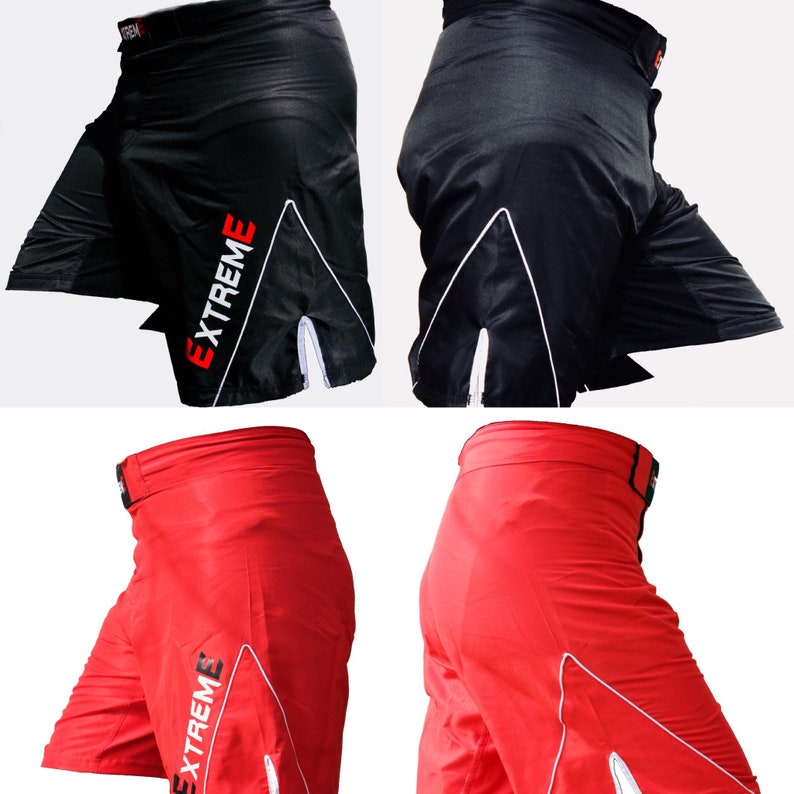 K&ouml;nnte beinhalten: Zwei Paar Sport-Shorts mit einem wei&szlig;en Streifen und dem Wort "EXTREME" in Rot. Ein Paar ist schwarz und das andere rot.