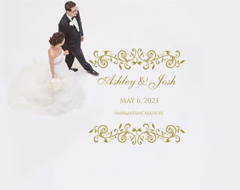 May include: A wedding announcement featuring a photograph of a bride and groom walking towards the camera. The announcement has a gold floral design and the text "Ashley & Josh", "May 6, 2023", and "#MR&MRSMCMAHON".