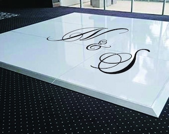 May include: A white dance floor with a black monogram of the letters "M & S" in a cursive font.