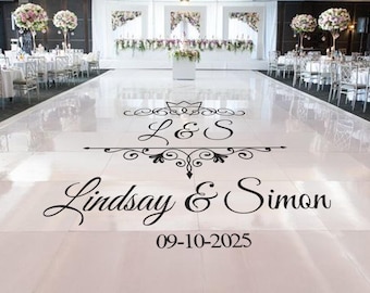 May include: A white dance floor with a black vinyl decal that says "L&S Lindsay & Simon 09-10-2025".