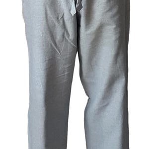 May include: Gray sweatpants with a drawstring waist.