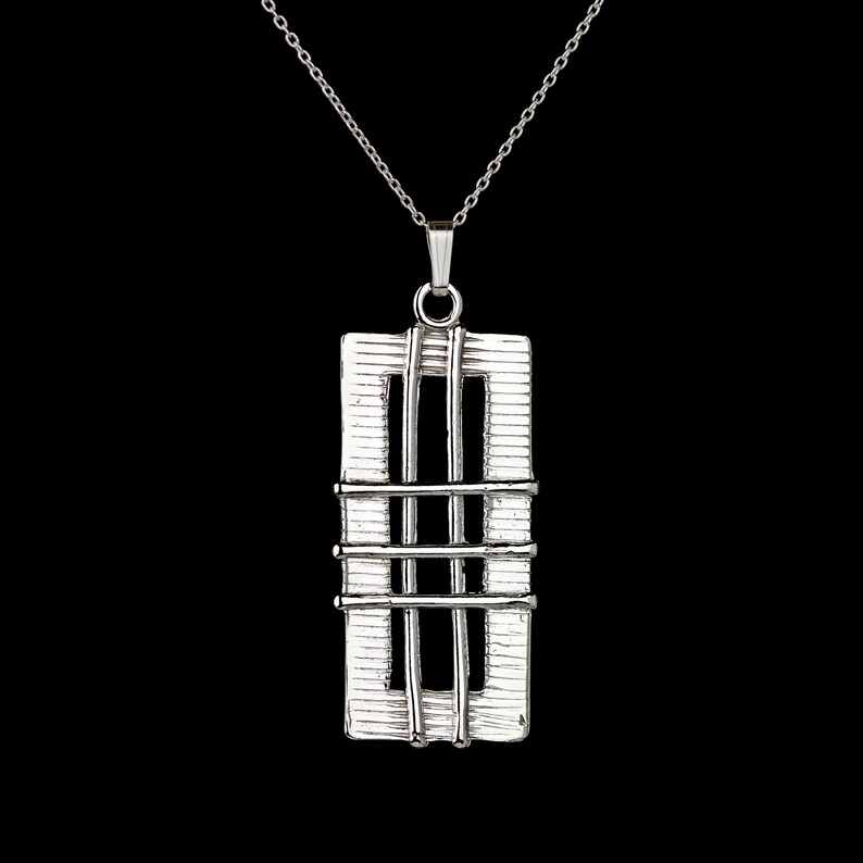 Hand-crafted sterling silver pendant made in Seville Spain