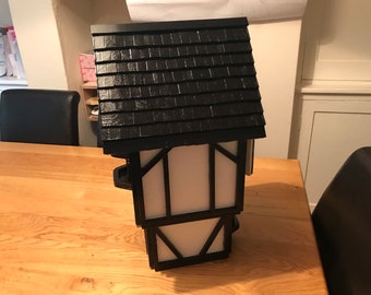 Unique, handmade, Tudor birdhouse.