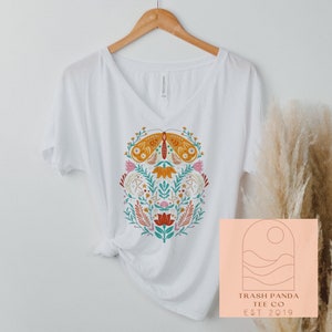 Women’s boho style floral moth print folk art slouchy V-neck T-shirt - relaxed loose drapey flowy tops for women - boho scandi art