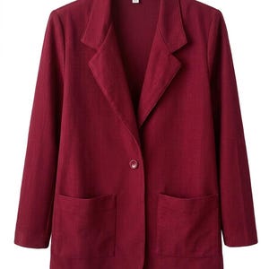 May include: A deep burgundy blazer featuring a vertical ribbed texture, a notched lapel collar, long sleeves, and two large patch pockets on the front. The garment is secured with a single matching button at the center and includes a white brand label.