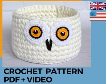 May include: White crochet owl-shaped basket with black eyes and a black beak. The basket is a crochet pattern for a fruit basket, jewelry box, or makeup organizer. The text "CROCHET PATTERN PDF + VIDEO" is at the bottom of the image.