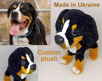May include: Custom plush toy of a Bernese Mountain Dog, crocheted in black, white, and brown yarn. The toy is sitting on a white surface and has the text "Made in Ukraine" and "Custom plush" written on the image.
