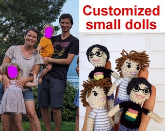 May include: Four crocheted finger puppets, each with a different hairstyle and clothing. The puppets are holding hands and have smiling faces. The puppets are all wearing glasses. The text "Customized small dolls" is written in red letters at the top of the image.