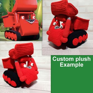 May include: A red crocheted plush toy of a dumper truck. The truck has a black cab and black tracks. The toy is a custom plush example.