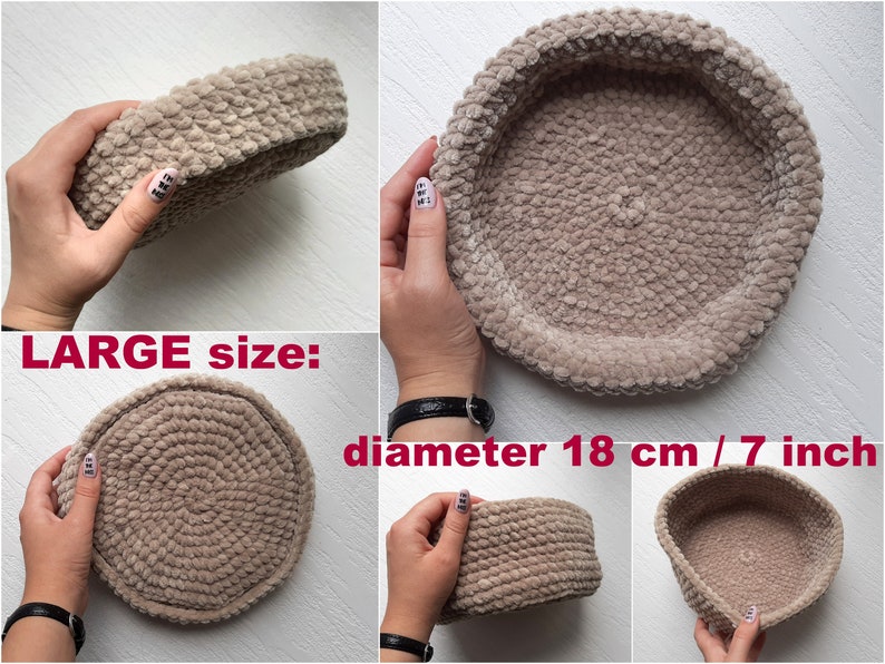 May include: A large, beige, crocheted basket with a diameter of 18 inches. The basket is made of soft, fuzzy yarn and has a round shape.