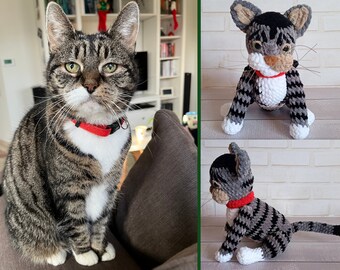 May include: A tabby cat wearing a red collar sits on a brown couch. Next to the cat are two crocheted cat toys, one gray and black with a red collar, and the other gray and black with a white collar.
