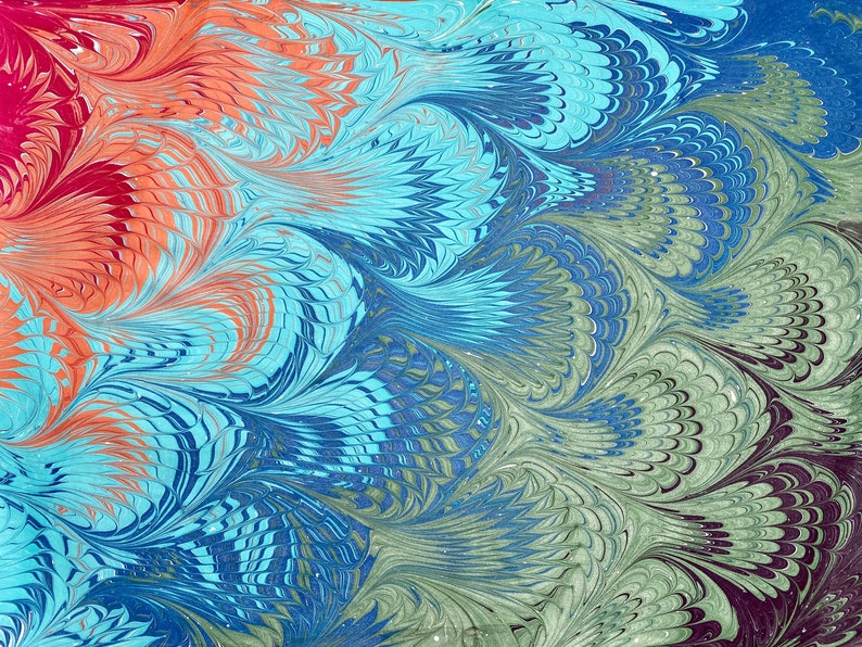 May include: Abstract art painting with swirling patterns in shades of red, orange, blue, green, and black. The colors blend together to create a unique and eye-catching design.