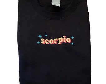 Felpa girocollo unisex personalizzata con ricamo Zodiac