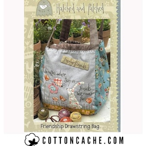 May include: A friendship drawstring bag with a light gray front panel featuring a floral and bunny design. The bag has a blue floral patterned side panel and the text "Forever Friends". The bag has a brown handle and the text "COTTONCACHE.COM".
