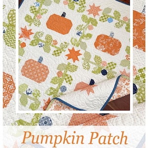 May include: A quilt pattern featuring a patchwork design with pumpkins, stars, and leaves in shades of orange, green, and blue. The pattern is called "Pumpkin Patch" and is available from The Pattern Basket.