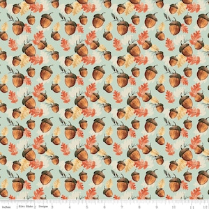 May include: A repeating pattern of watercolor acorns and leaves in shades of brown, orange, and yellow on a light teal background. The design features detailed illustrations of acorns with their caps and various leaf shapes, creating a fall-themed aesthetic.