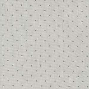 May include: A light gray fabric with a repeating pattern of small, evenly spaced gray dots. The dots are circular and create a simple, yet visually appealing design. The fabric has a slightly textured appearance.