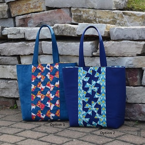 May include: Two blue tote bags with different patterned fabric panels. The tote bags are 13 inches tall, 15 and 3/4 inches wide, and 4 inches deep. The text "Twister Sisters Center Twist Tote" is at the top of the image. The text "TWS107" is at the bottom of the image. The text "Option 1" is below the left tote bag. The text "Option 2" is below the right tote bag.