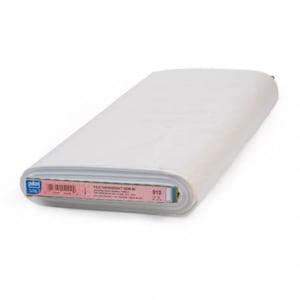 May include: A white roll of Pellon Featherweight 30/30 fusible interfacing. The label reads "Featherweight 30/30 in. Fusible Interfacing Made in USA 910 20 in x 25 yd."