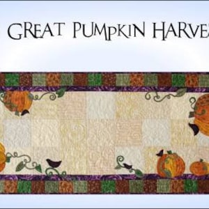 May include: A quilting pattern for a table runner featuring a fall harvest theme with pumpkins, vines, and birds. The pattern is titled "The Great Pumpkin Harvest" and is by Saginaw Quilts.