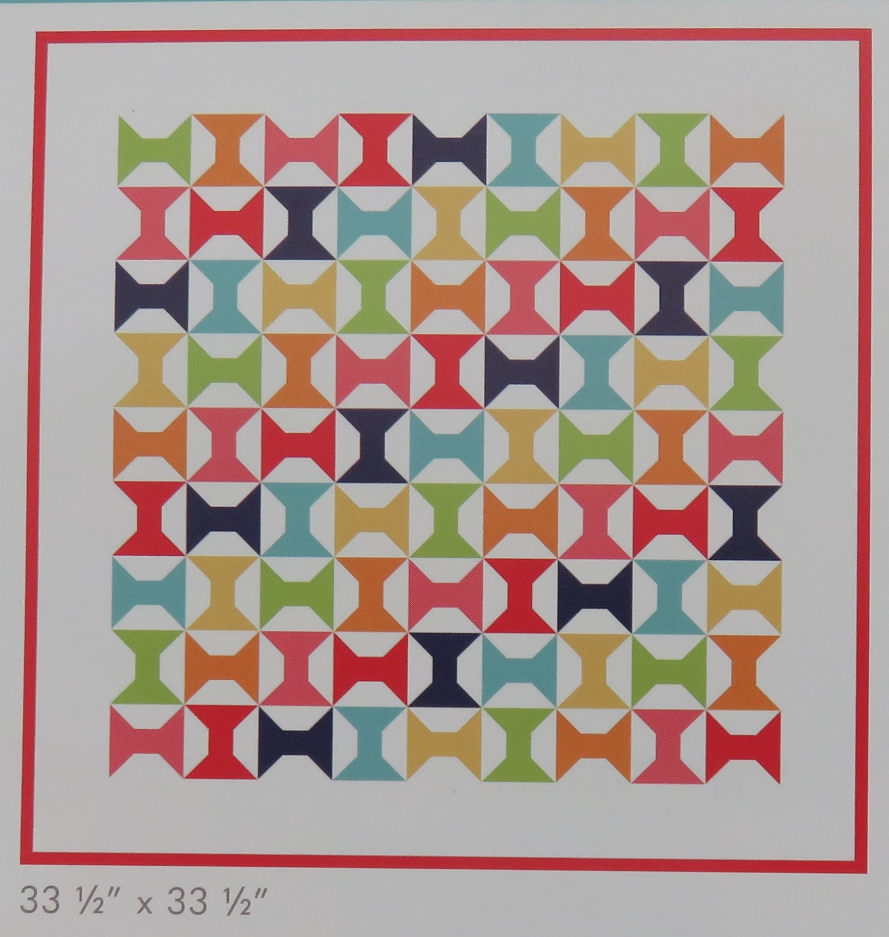 Triangles on a Roll Quilt Book by It's Sew Emma
