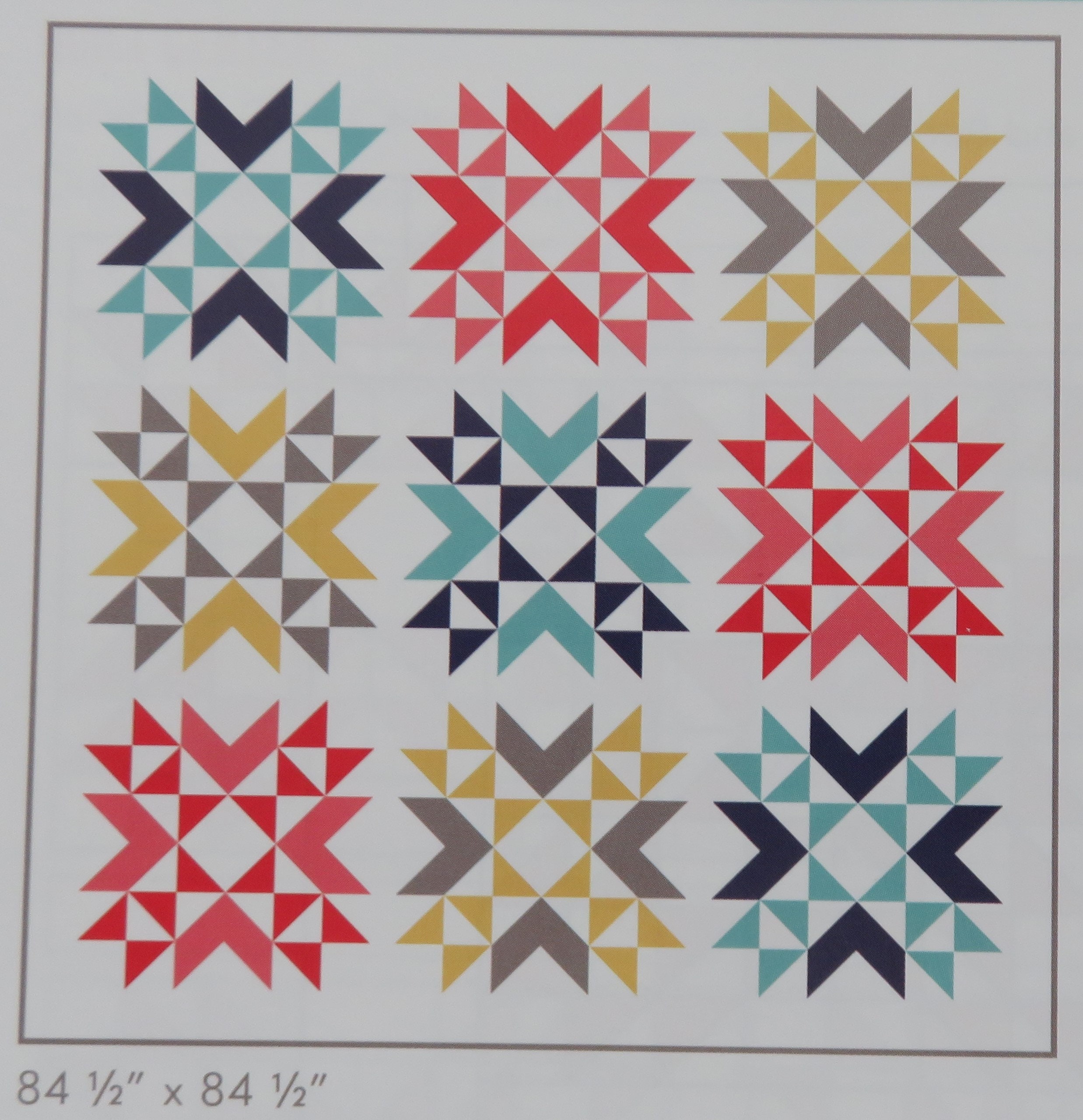 Triangles on a Roll Quilt Book by It's Sew Emma