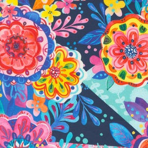 May include: A colorful floral pattern fabric with bright pink, yellow, blue, and green flowers on a dark blue background.