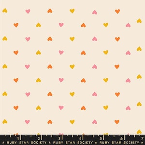 May include: A seamless pattern featuring a repeating design of small hearts in shades of pink, orange, and yellow on a cream background.