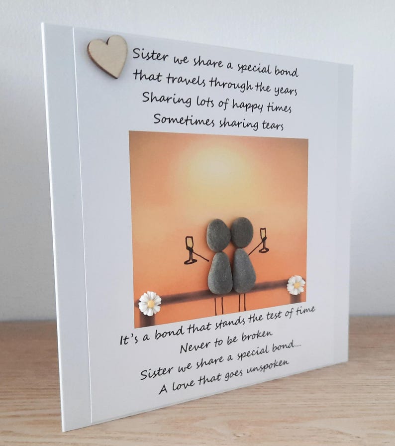 May include: A card with a poem about sisterhood. The poem reads "Sister we share a special bond that travels through the years. Sharing lots of happy times. Sometimes sharing tears. It's a bond that stands the test of time. Never to be broken. Sister we share a special bond... A love that goes unspoken."