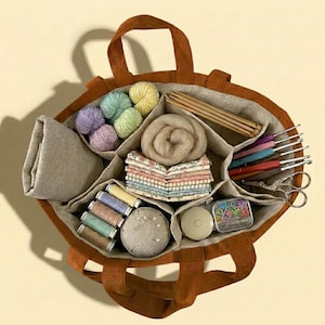 May include: A rust-colored fabric craft organizer bag with multiple internal compartments filled with various supplies including yarn balls, wooden knitting needles, crochet hooks, fabric squares, spools of thread, a pin cushion, and scissors.