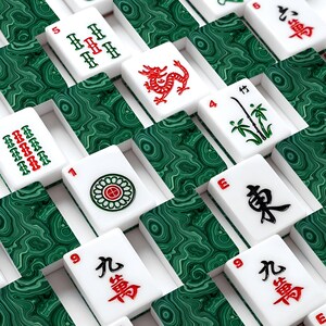 May include: A set of Mahjong tiles featuring a white face with black, red, and green traditional symbols and characters, paired with a dark green malachite-patterned back. The tiles are arranged in a grid pattern, showcasing various suits.