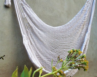 Beautiful and roomy hammock chair soft and resistant natural cotton and high quality solid wood hanging handmade. Express shipping.