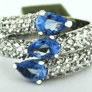 Tanzanite 1.54 Cts & White Sapphires Ring Silver Plated