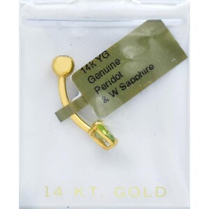 May include: 14K yellow gold belly button ring with a green peridot gemstone. The ring is packaged in a clear plastic bag with a label that reads "14K YG Genuine Peridot & W Sapphire".