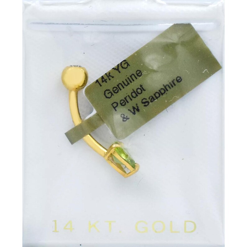 May include: 14K yellow gold belly button ring with a green peridot gemstone. The ring is packaged in a clear plastic bag with a label that reads "14K YG Genuine Peridot & W Sapphire".