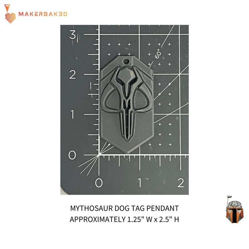 May include: A gray Mythosaur dog tag pendant, approximately 1.25 inches wide and 2.5 inches high. The tag features a detailed design of the Mythosaur skull. The tag is shown on a black grid background.