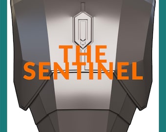May include: A metallic gray chest plate armor piece featuring a geometric, angular design with a central vertical emblem. The text THE SENTINEL is printed in bold orange capital letters across the center of the smooth, reflective surface.