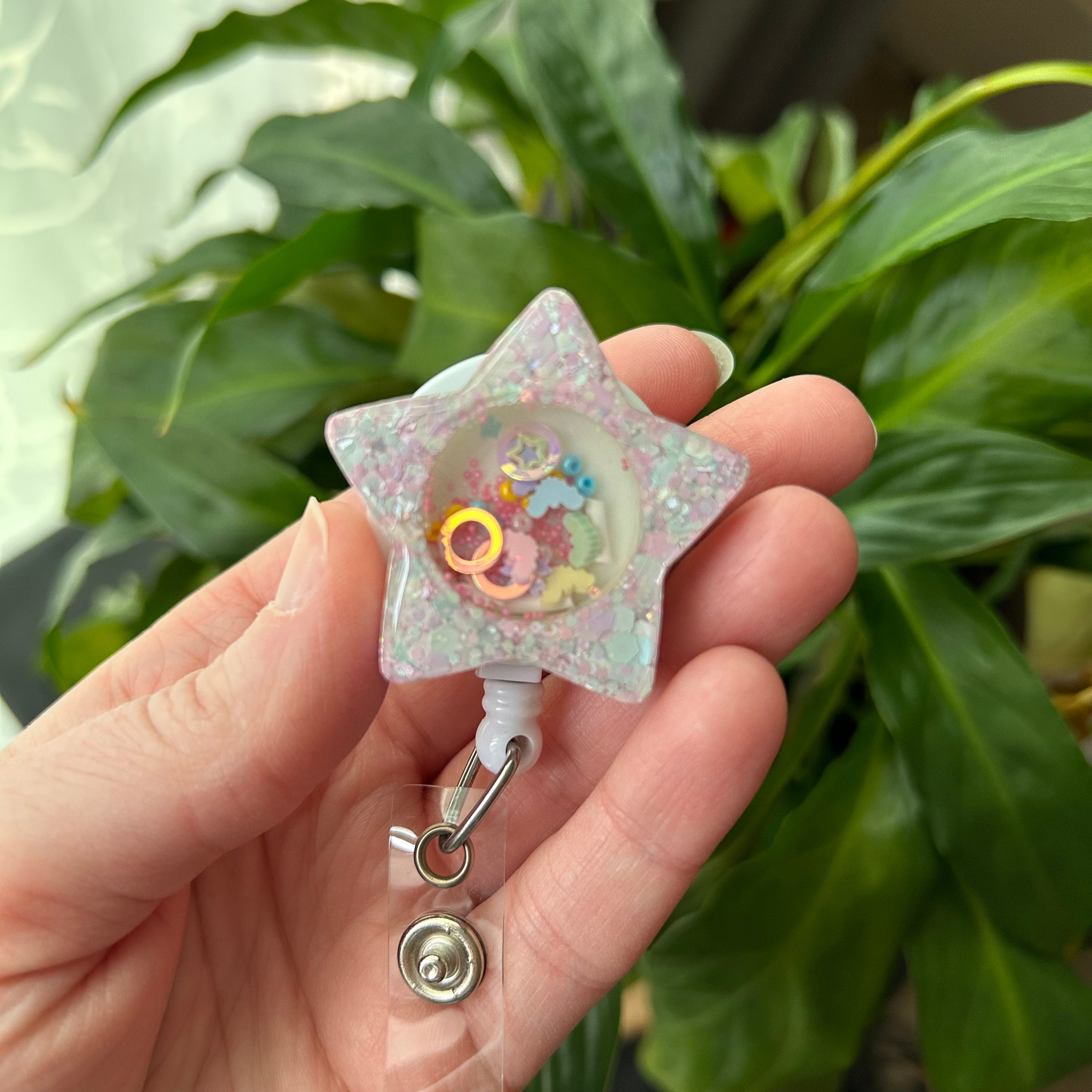 Spooky cute star shaker resin badge reel