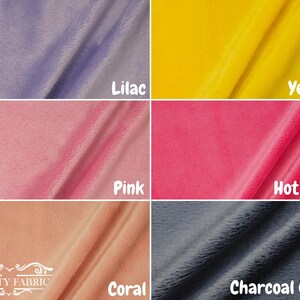May include: Six fabric swatches in different colors: lilac, yellow, pink, hot pink, coral, and charcoal gray. The fabric is soft and fuzzy.