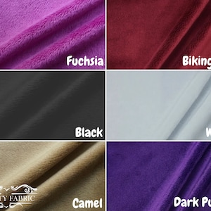 May include: Six fabric swatches in different colors: fuchsia, biking red, black, white, camel, and dark purple. The swatches are arranged in a grid pattern.