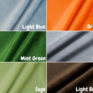 May include: Six fabric swatches in different colors: light blue, orange, mint green, gray, sage, and light brown.