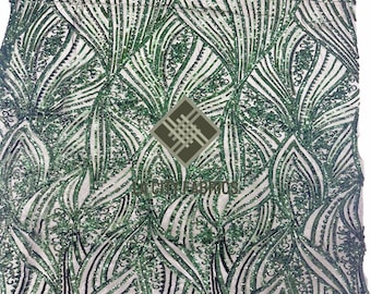 May include: Green and black sequined fabric with a wavy pattern. The sequins are arranged in a repeating pattern of leaves.
