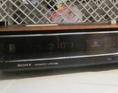 one Sony Digimatic Lifetime flip alarm clock. With radio But no backlight because I 39 m stupid Read on